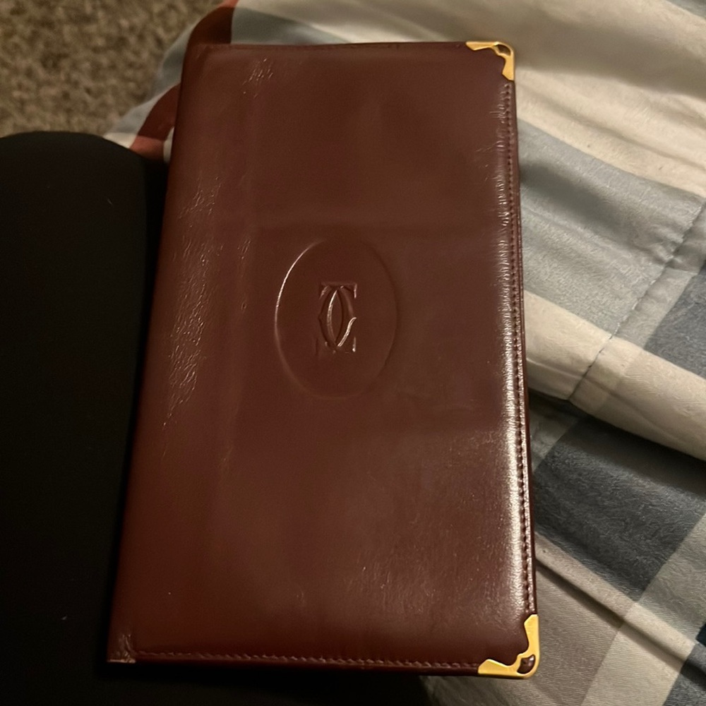 Cartier Bordeaux wallet, gold hard wear on corners